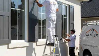 Professional shutter painting and refinishing on a home exterior in Lafayette, LA
